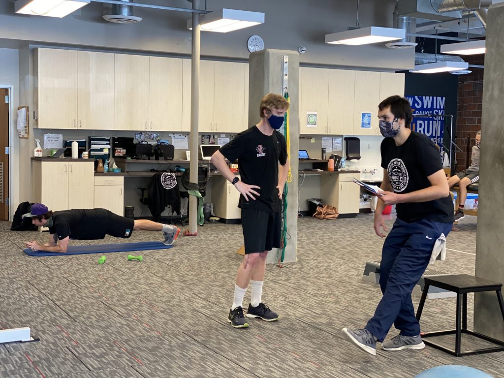 Ankle strengthening exercise demonstration at Rausch Physical Therapy